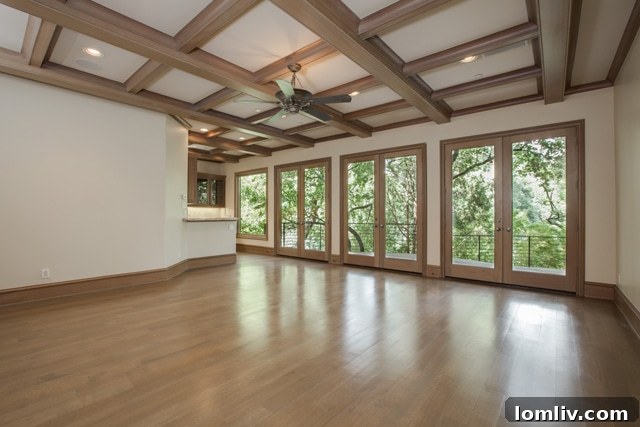 Downstairs Living Room with Cozy Fireplace and Creek Views