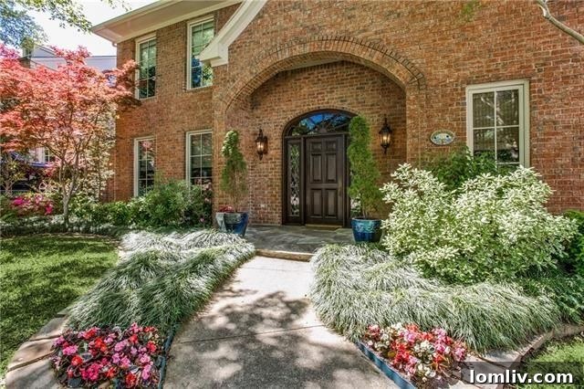 Elegant exterior of 6311 Club Lake Ct Tudor home