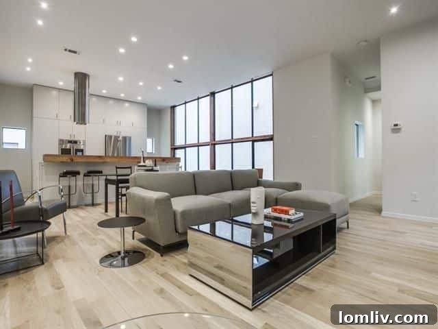 Modern kitchen with white cabinets and gas cooktop