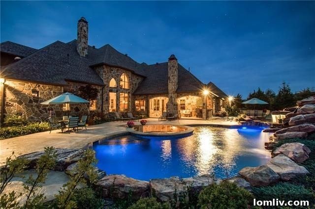 Spacious fire pit area with stone pavers for outdoor gatherings