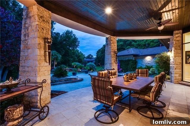 Serene saltwater pool with water features at Fort Worth estate