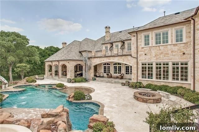 Elegant outdoor kitchen and dining area at Plano estate
