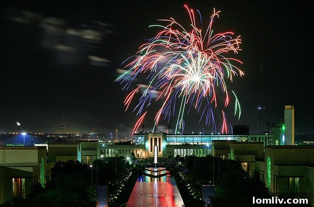 Fireworks display over Fair Park Dallas, highlighting the iconic architecture