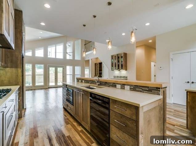 Sleek Kitchen Island and Contemporary Lighting