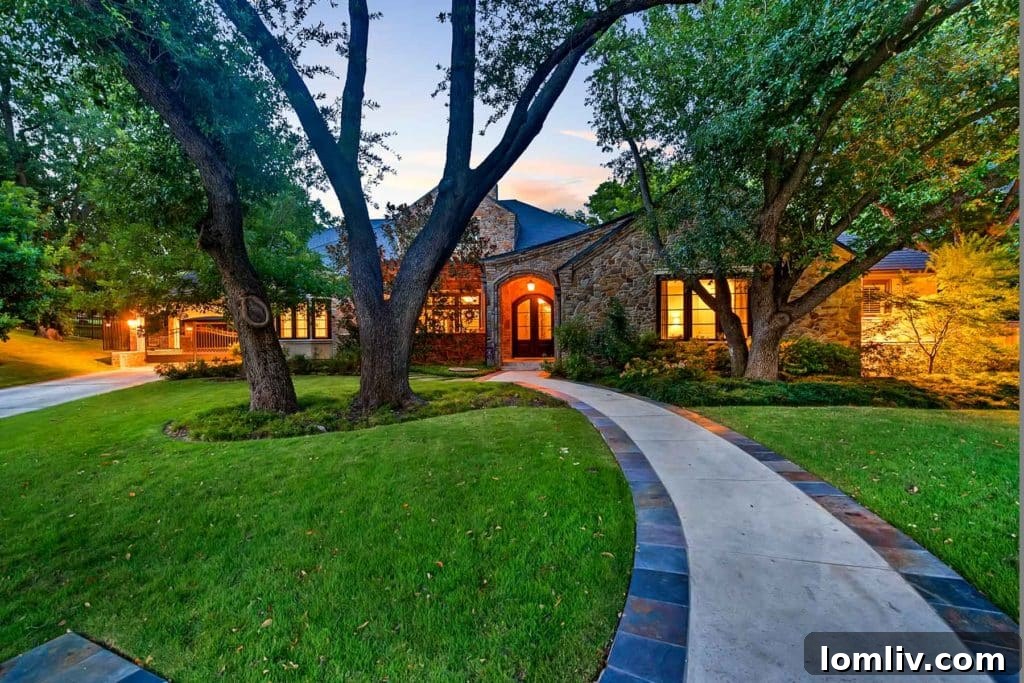 Stunning stone exterior of 1701 Dakar Road in Fort Worth, nestled among mature trees