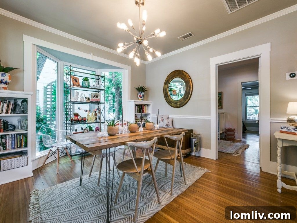Elegant dining area with vintage atomic-style light fixture