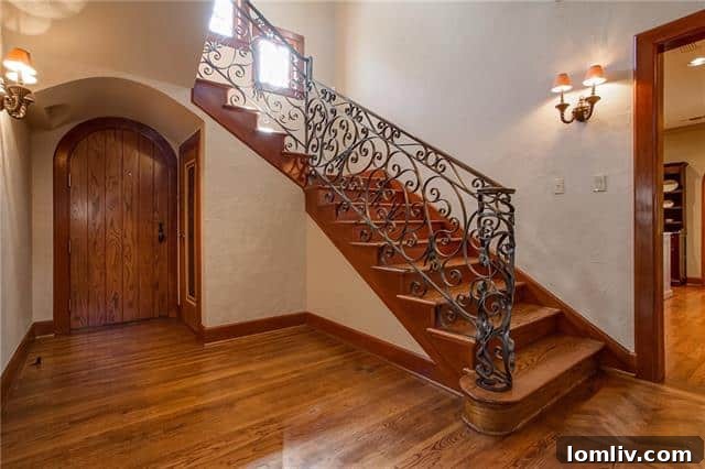 Inviting Entryway and Grand Staircase of Monticello Tudor