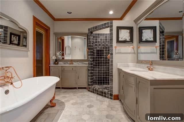 Luxurious Master Bathroom with Marble and Claw Foot Tub