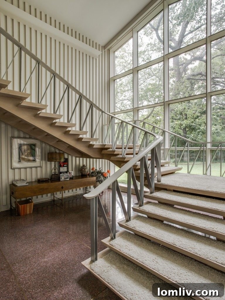 Waterfront perspective of the Grady Vaughn House and its lush surroundings