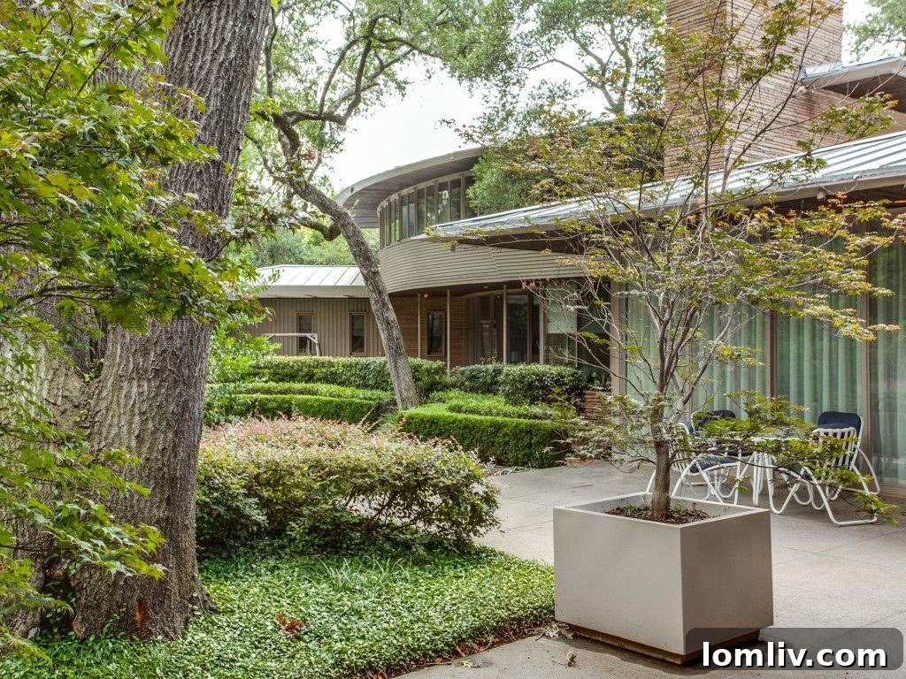 Lush landscaping and architectural details of the Grady Vaughn House, Dallas