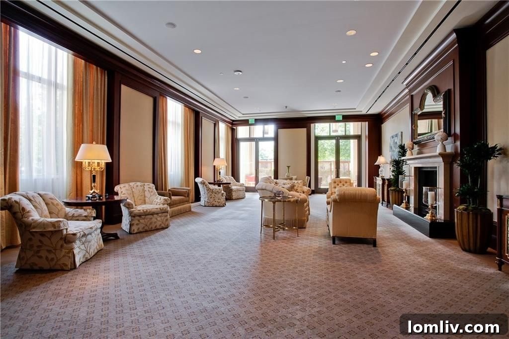 Luxurious living room in Ritz Residences with a grand fireplace and classic decor