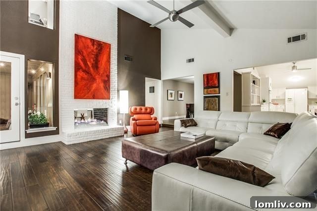 Interior living room with high ceilings and fireplace