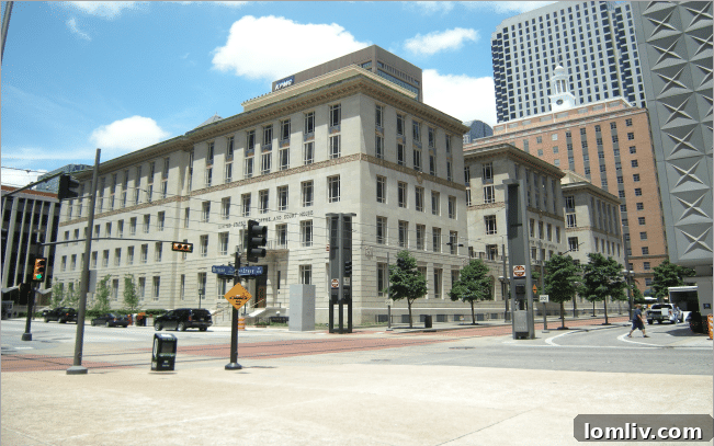 The majestic facade of 400 North Ervay, formerly the Dallas Post Office and Court House, now luxury lofts.