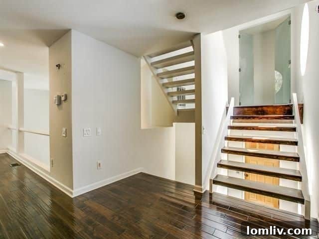 Architectural open stairs connecting the various levels of the home