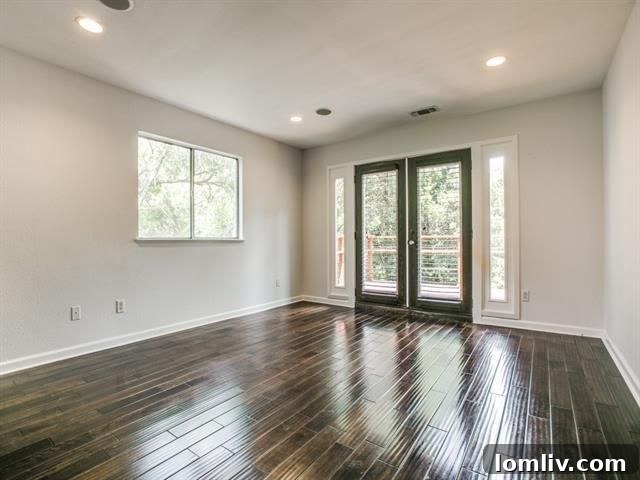 Luxurious fifth-level master bedroom with direct access to a private balcony