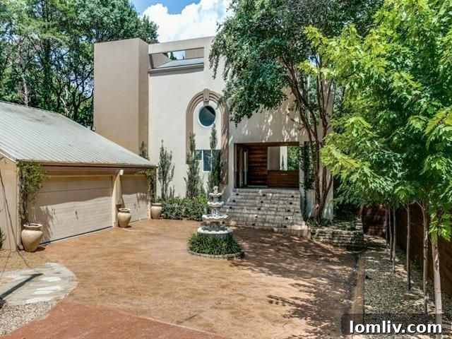 Lush backyard with custom swimming pool, blending with nature at 3320 S. Ravinia Dr.