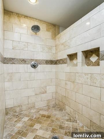 Modern and custom-designed shower in the fifth-level master bathroom