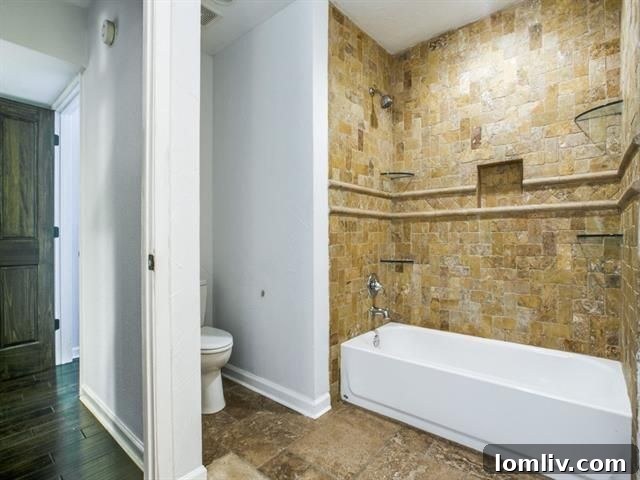Stylish and functional ground-level master bathroom