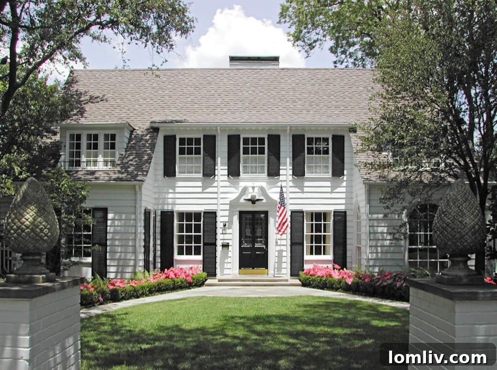 Example of Wilson Fuqua's classical residential architecture, a stately Cape Cod style home