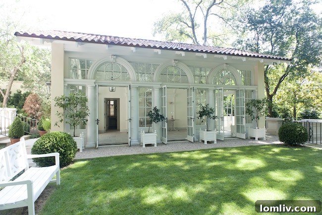 Orangerie exterior showcasing classical design elements by Wilson Fuqua