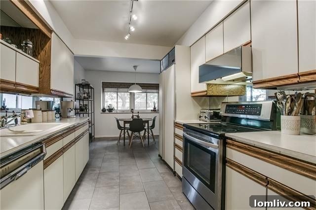 Luxuriously remodeled primary bathroom with modern fixtures and a large shower