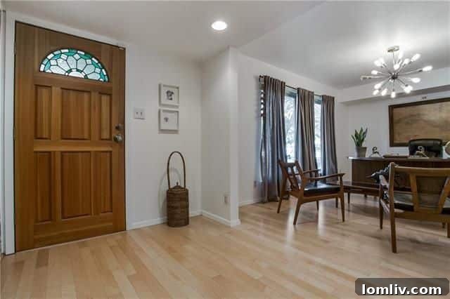 Bright and spacious formal dining room, currently used as a home office, featuring a retro sputnik chandelier