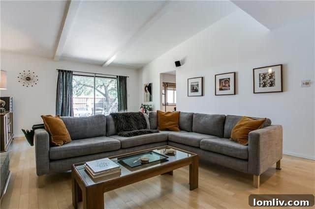 Well-maintained kitchen featuring stainless steel appliances and ample space for a breakfast table