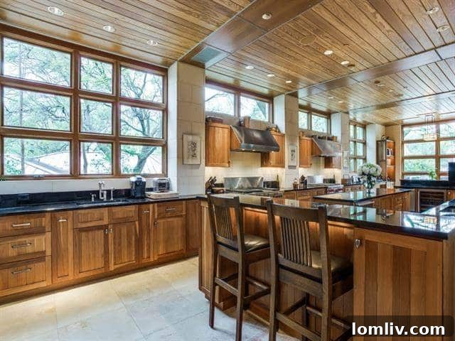 North Dallas Peak: Bionic Alpine Estate Merges Colorado Serenity with an Expansive Wardrobe 11 Forest Creek Place - Modern Kitchen View 4