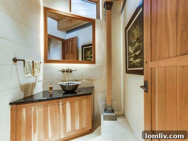 North Dallas Peak: Bionic Alpine Estate Merges Colorado Serenity with an Expansive Wardrobe 14 Forest Creek Place - Chic Powder Room