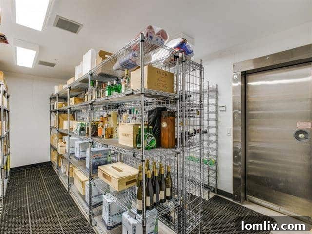 North Dallas Peak: Bionic Alpine Estate Merges Colorado Serenity with an Expansive Wardrobe 26 Forest Creek Place - Wine Cellar View 2