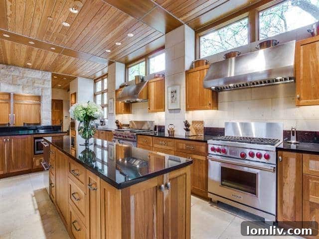 North Dallas Peak: Bionic Alpine Estate Merges Colorado Serenity with an Expansive Wardrobe 8 Forest Creek Place - Modern Kitchen View 1