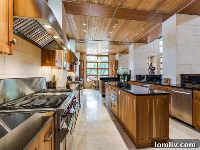 North Dallas Peak: Bionic Alpine Estate Merges Colorado Serenity with an Expansive Wardrobe 10 Forest Creek Place - Modern Kitchen View 3