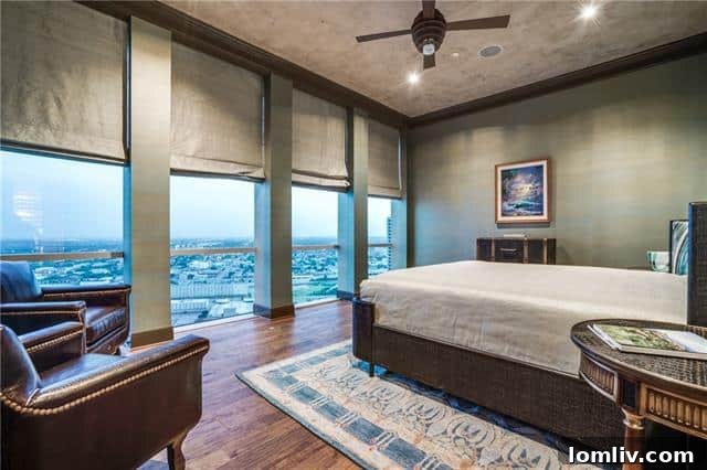 Gallery office overlooking the master bedroom with a fireplace