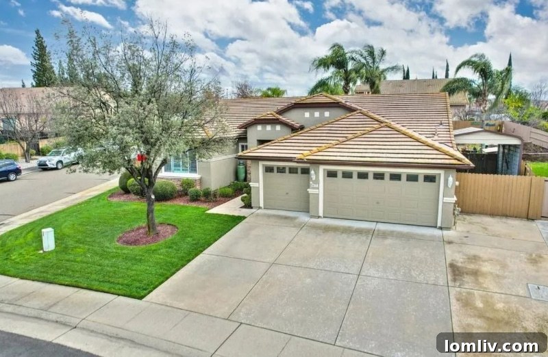 California's Parrothead Paradise: Your Margaritaville Escape 4 Beautifully landscaped front yard of a Folsom, CA home, showcasing curb appeal on a corner lot.