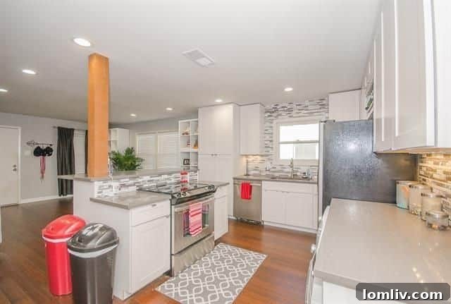 Glass tile backsplash in remodeled Dallas kitchen