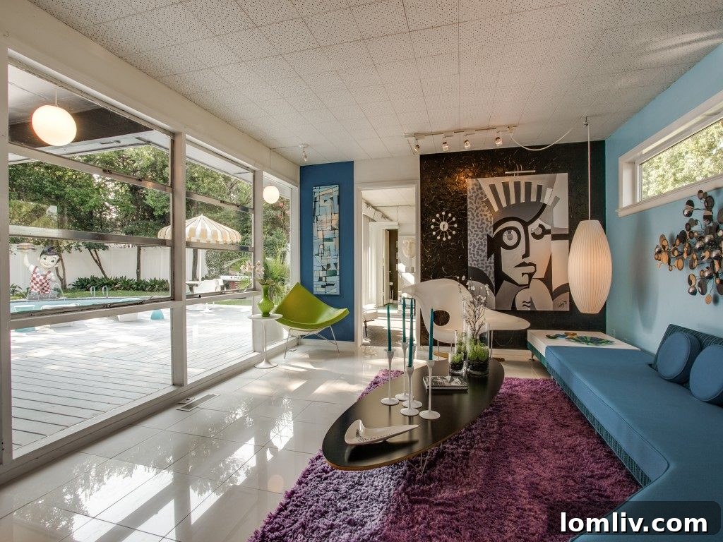 Comfortably styled third bedroom, harmoniously integrated within the home's MCM aesthetic