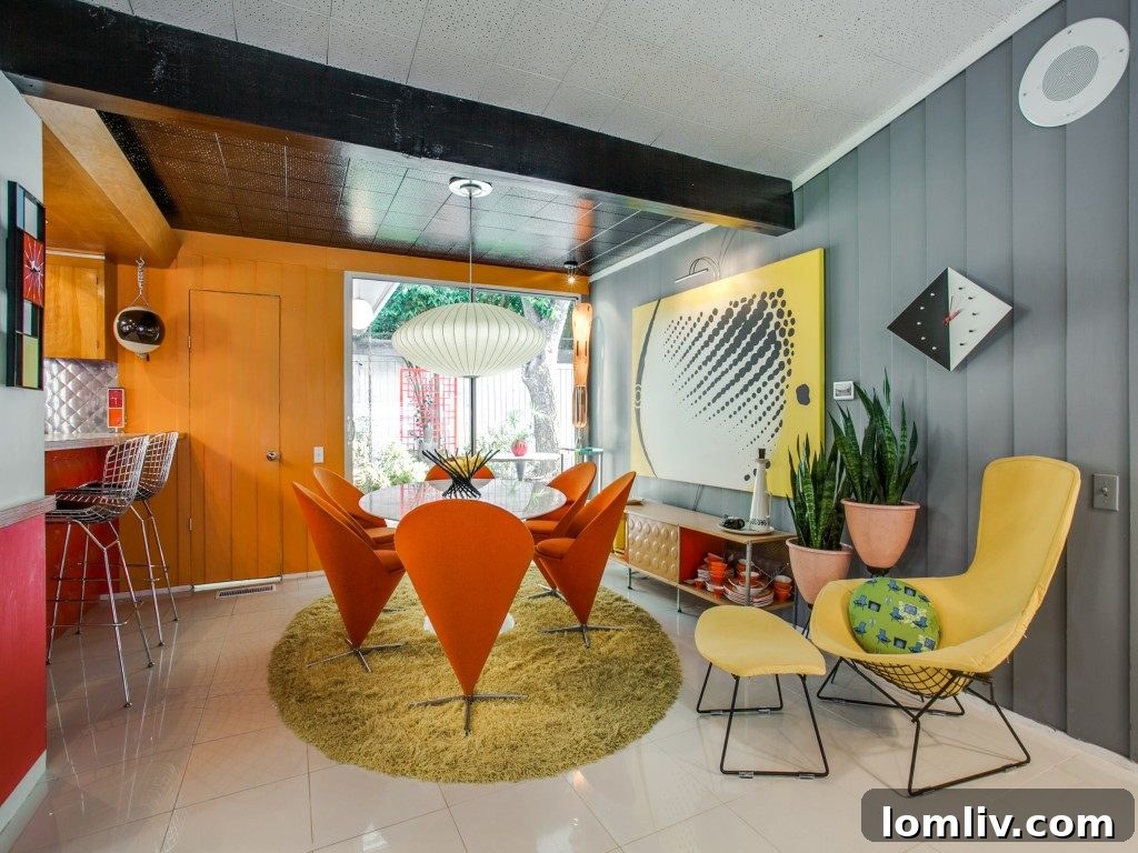 Bright and airy interior showcasing carefully curated Midcentury Modern furniture and decor