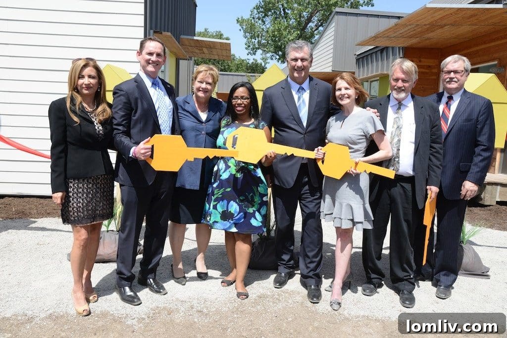 Dallas Mayor Mike Rawlings and city leaders celebrate the unlocking of The Cottages at Hickory Crossing, providing homes for the chronically homeless.