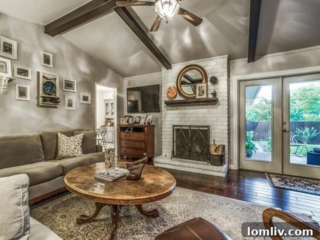 Inviting living area with hardwood floors and vaulted ceilings