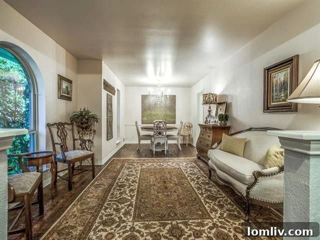 Renovated eat-in kitchen with granite counters and designer paint