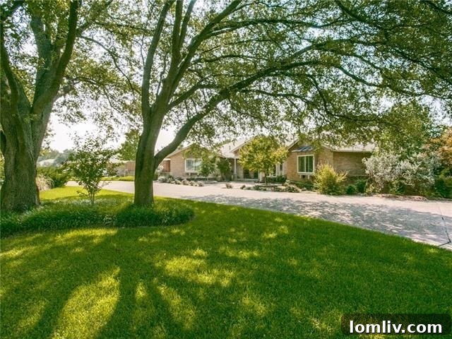 Estate-like ranch home exterior on a large lot at 5522 Royal Crest Dr, Russwood Acres