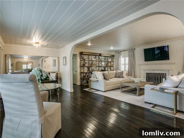 Bright and airy living space with dark hardwood floors at 5435 Westside Dr