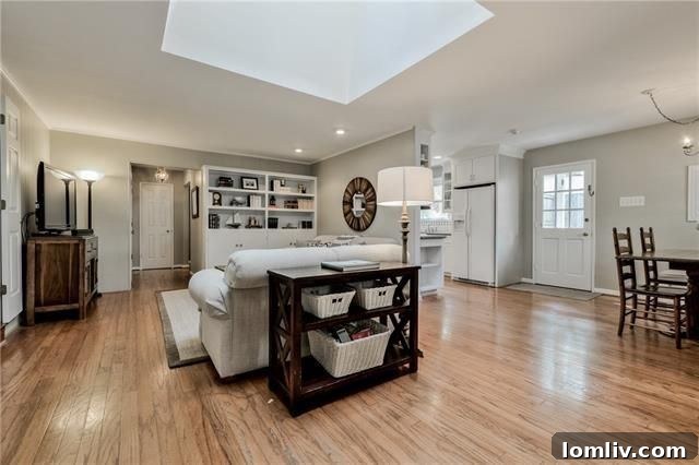 Bright living room with a huge skylight in 9925 Estate Ln.