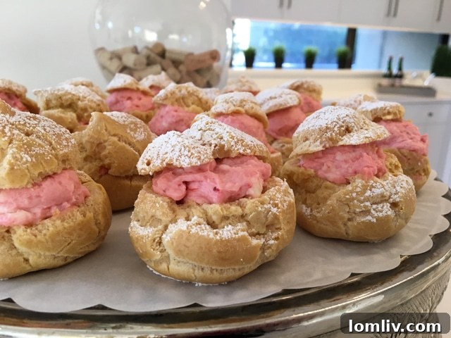 Delicious strawberry cream puffs, lovingly prepared and presented, serving as a delightful treat at The Warrington event's conclusion.