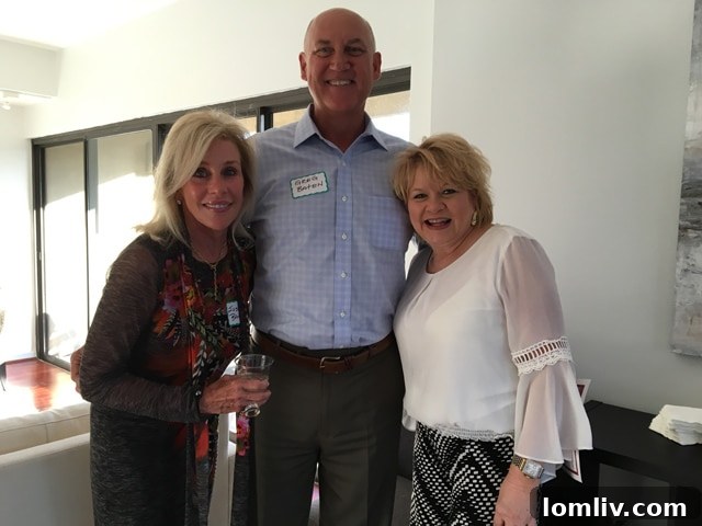 Tammy Mclaine of Keller Williams, agent for Unit 3C, engaging with seasoned renovators Greg and Susan Batan, at The Warrington event, highlighting collaborative real estate discussions.