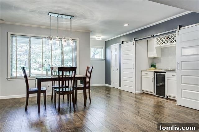 Modern kitchen with large island and pendant lights