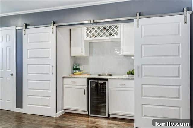 Stainless steel appliances and white cabinetry
