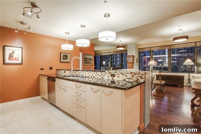 Detailed view of the master bathroom's contemporary commode and storage