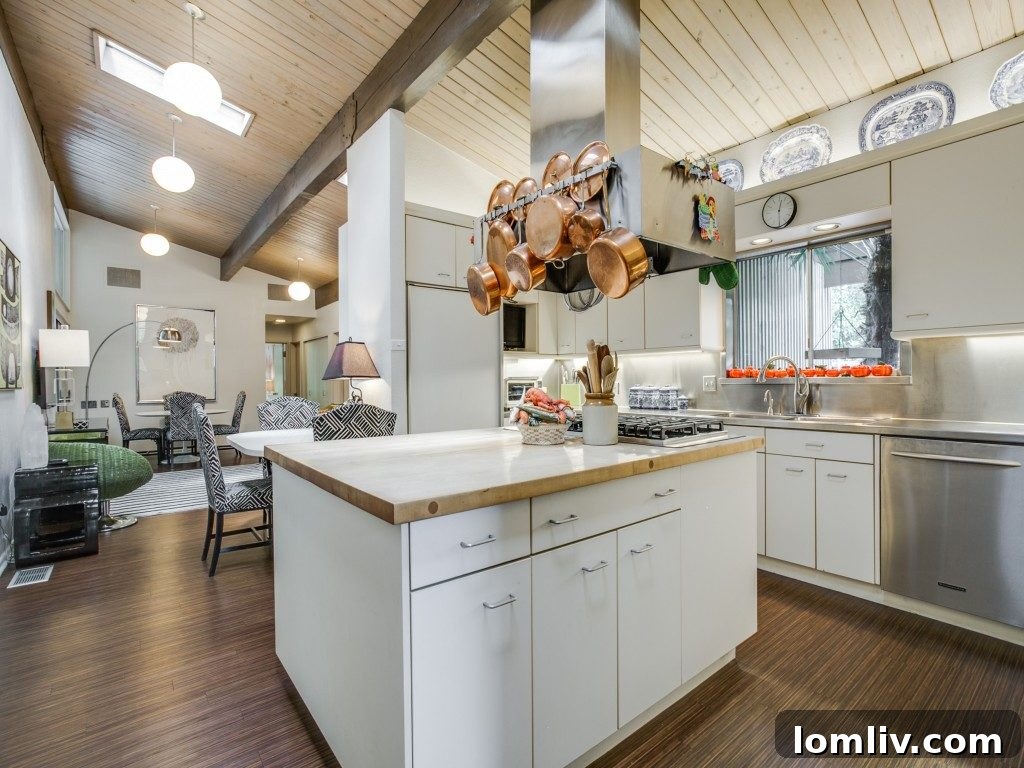 Luxuriously updated kitchen at 7115 Brookshire Circle, blending modern amenities with midcentury aesthetics.