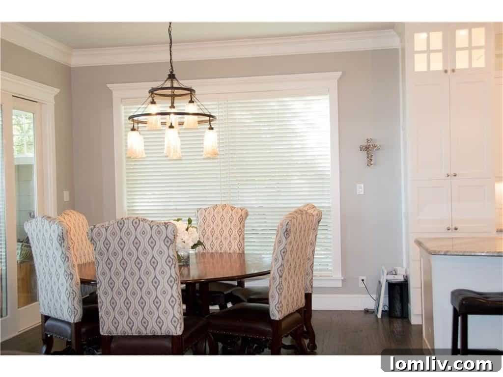 Elegant Dining Area with Lake Views in Waterfront Property